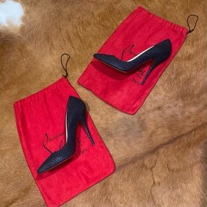 Christian Louboutin black python pumps